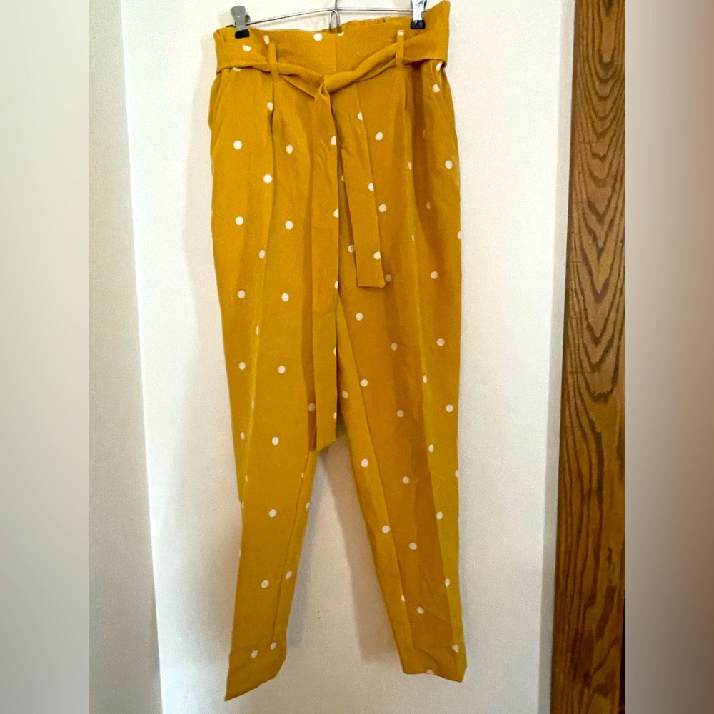 Dress pants yellow with white polka dots.   New without tags!